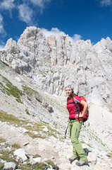 Naklejka premium A smiling girl on the mountain trail, Abruzzo, Italy