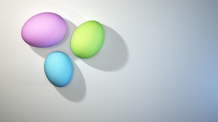 Cluster of three pastel Easter eggs on a bright white background