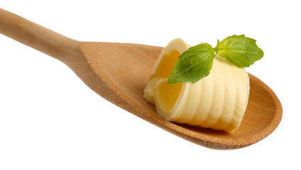 Curl of fresh butter with basil