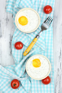 Baked Eggs On Table Close Up