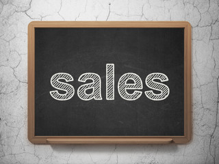 Advertising concept: Sales on chalkboard background