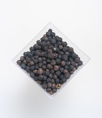 black pepper on white