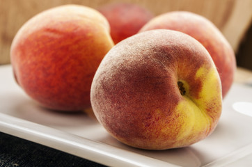 peaches in wooden background