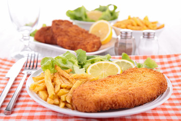breaded meat and french fries