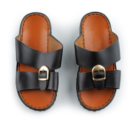 Traditional Arabic sandals shot against a white background