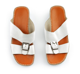 Traditional Arabic sandals shot against a white background