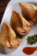 Samosa  is an Indain fried or baked pastry with a savory filling