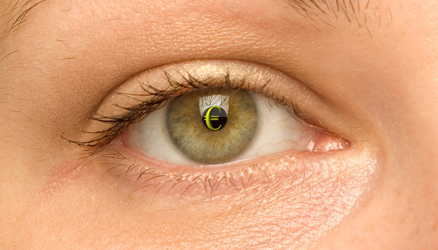 woman eye with the symbol of Euro