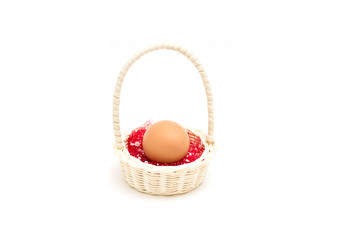 Fototapeta na wymiar Brown eggs in the basket on white.