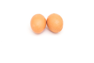 two eggs are isolated on a white background