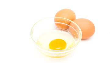 Egg in bowl isolated on white background
