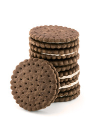 Pile of chocolate cream cookies isolated on white