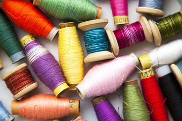 Coils with colored threads