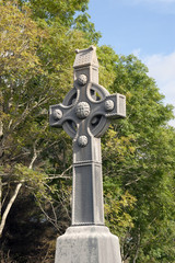 saint Columba memorial celtic cross and trees