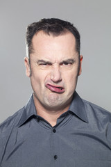 Obraz premium grimace of a manager at work