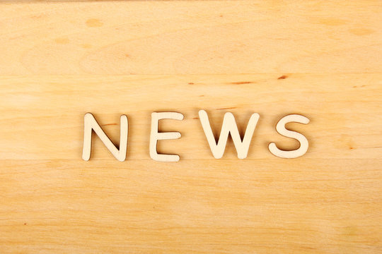 Wooden letters "news"