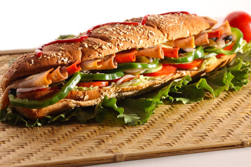 Chicken and Turkey Ham Sandwich with vegetables, brown bread