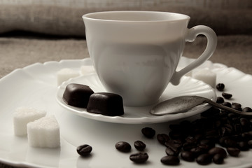 Cup of coffee with cream and truffle