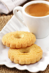 Morning cup of strong espresso coffee with butter cookies