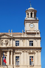 Fototapeta na wymiar Clock tower of Arles Town Hall