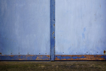 Hintergrund Detail einer blauen Tür aus Holz