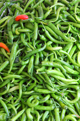 lot of green chilli peppers