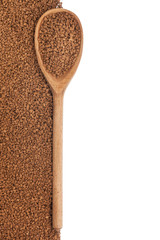 wooden spoon with granulated coffee
