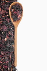 Wooden spoon with dried hibiscus