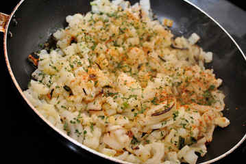 Frying Potatoes and Onions with Seasoning