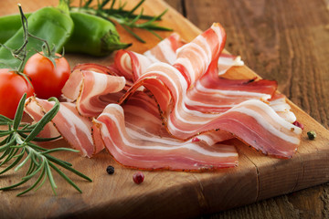 Bacon on wooden board