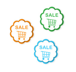 Colorful labels for sales in some colors with shopping cart icon
