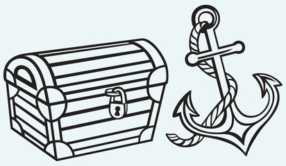 Chest and anchor isolated on blue background