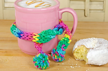 pink coffee cup with scarf