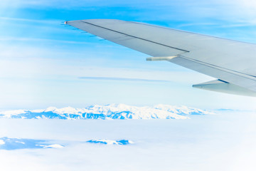 Fototapeta premium view of the wing of an airplane through the window