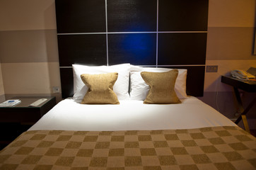 Bed in a hotel room
