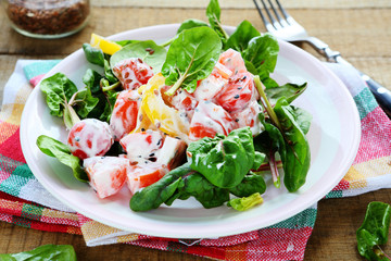 fresh salad with tomatoes, peppers and yogurt