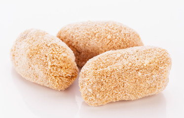 Frozen croquettes, before being cooked
