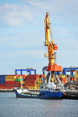 Fototapeta premium Bunker ship (fuel replenishment tanker) under port crane, Odessa