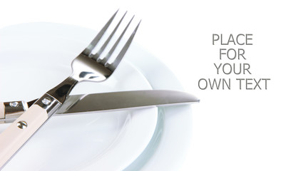 Knife, color plate and fork, isolated on white