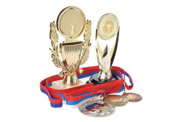 Cups and medals isolated on white