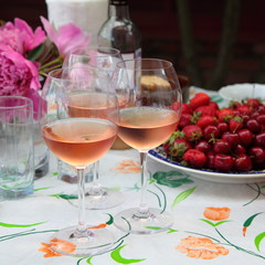 Cold rose wine and fruits