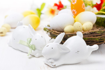Easter rabbits and basket with eggs