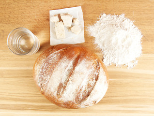 Composition with rye bread on wooden background