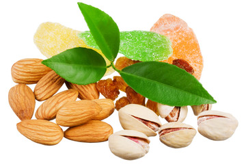 Assortment of tasty nuts with leaves