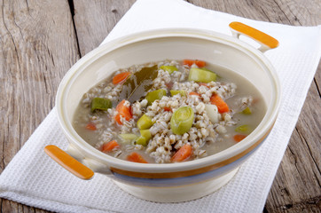 vegetarian pearl barley soup in a terrine