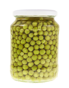 Glass jar full of green peas