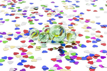 Toy marbles on white background