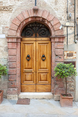Old elegant door in Italy - obrazy, fototapety, plakaty