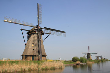 Windmills on the canal bank.