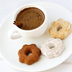 Cup of coffee and some cookies